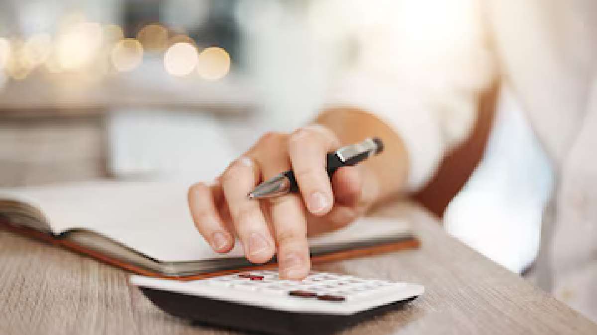 Small business owner reviewing financial documents